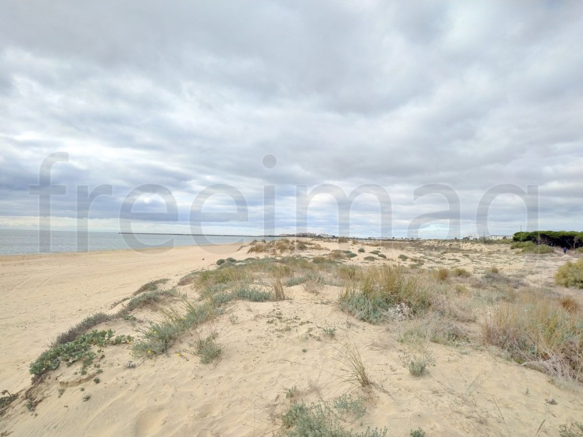 Arena playa en Isla Cristina, España