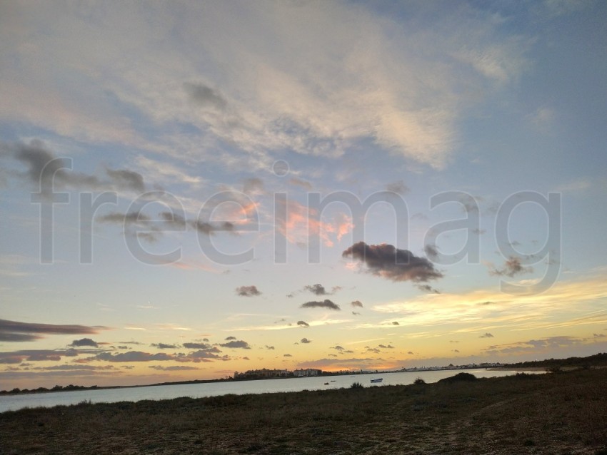 Isla Cristina playa atardecer en España.